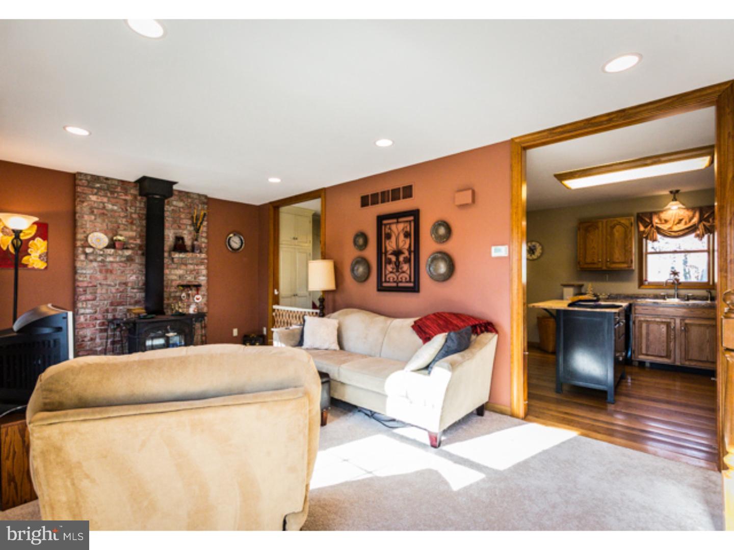 232 Cambridge Road Coatesville, PA 19320 - Photo 13 of 25 a living room with furniture and kitchen view