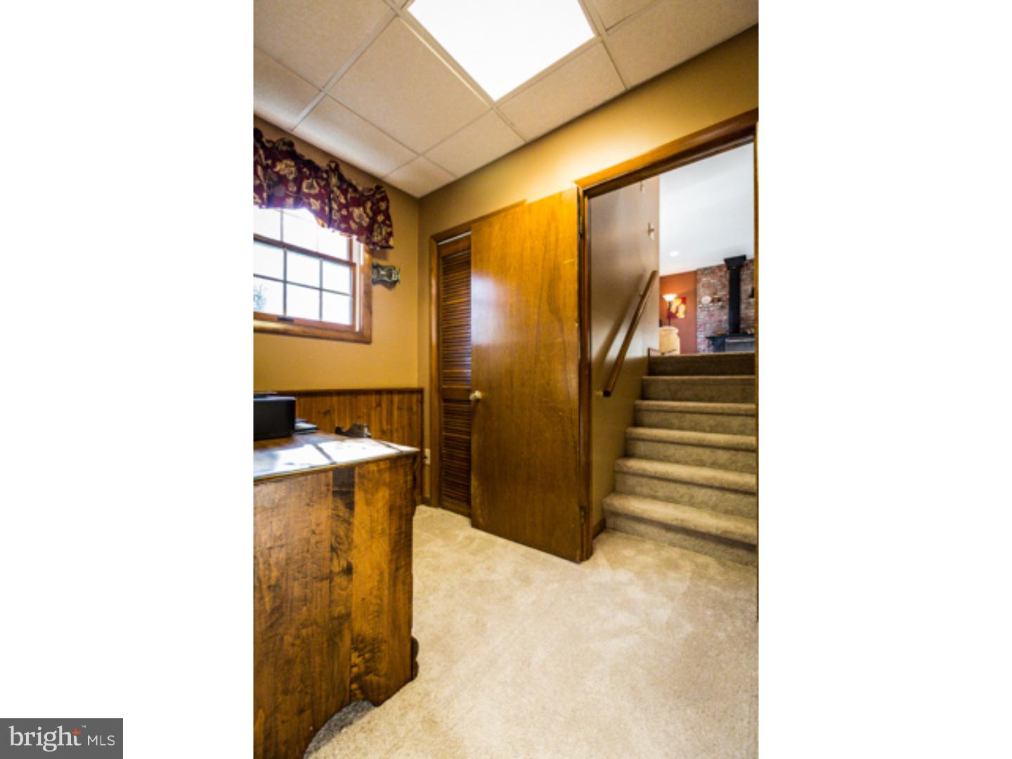 232 Cambridge Road Coatesville, PA 19320 - Photo 20 of 25 a view of a bathroom with a shower and a sink