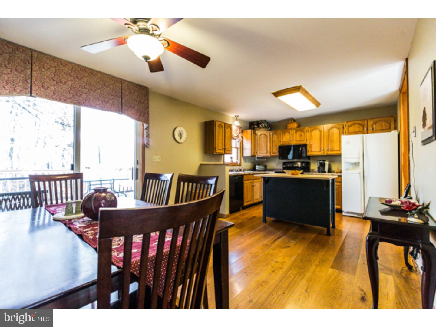 232 Cambridge Road Coatesville, PA 19320 - Photo 7 of 25 a view of a dining room with furniture window and outside view