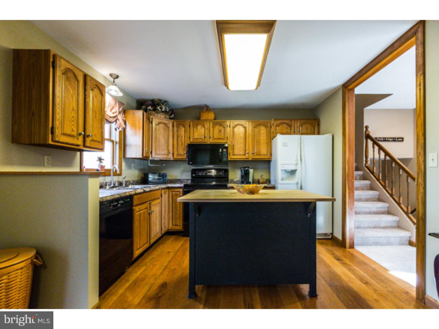 232 Cambridge Road Coatesville, PA 19320 - Photo 8 of 25 a kitchen with stainless steel appliances a stove a sink dishwasher and a refrigerator