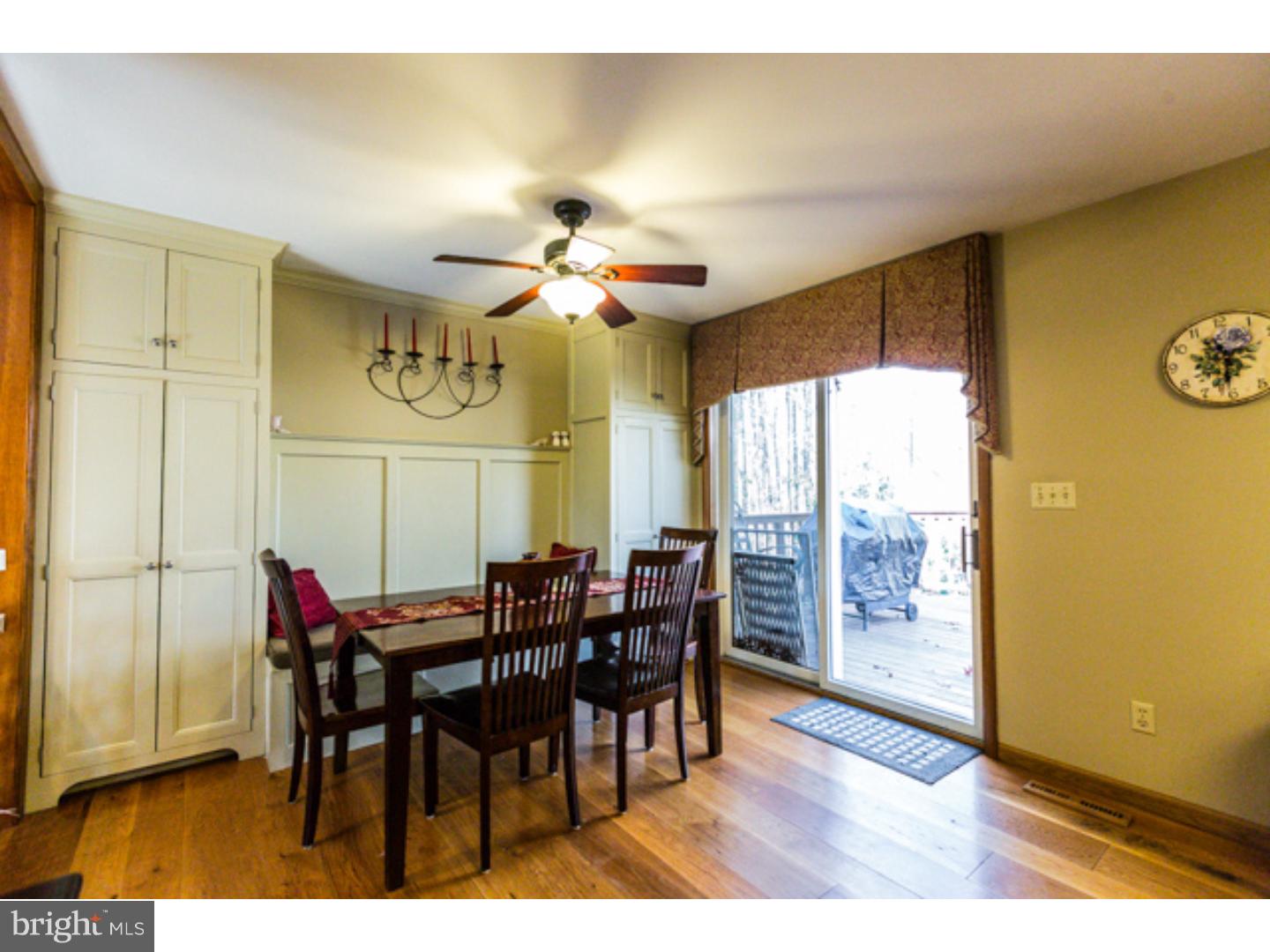232 Cambridge Road Coatesville, PA 19320 - Photo 9 of 25 a view of a dining room with furniture and chandelier