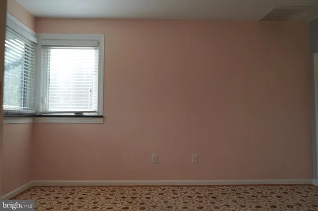 a view of a small space with a window