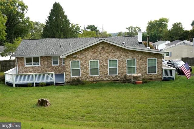 a view of a house with a swimming pool