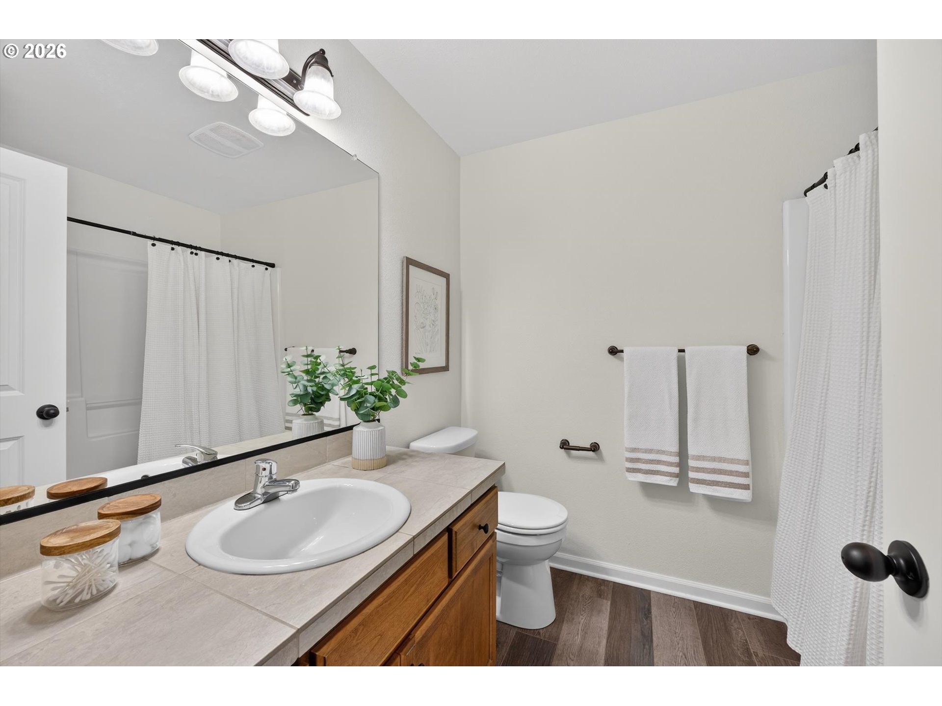16260 Southwest Mason Lane Beaverton, OR 97006 - Photo 18 of 41 a bathroom with a sink toilet and shower