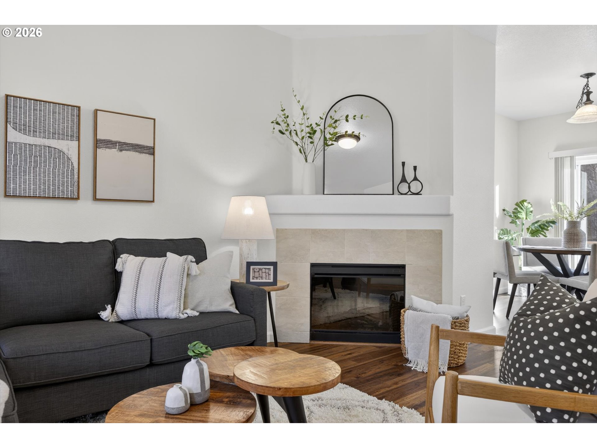 16260 Southwest Mason Lane Beaverton, OR 97006 - Photo 7 of 41 a living room with furniture a fireplace and rug