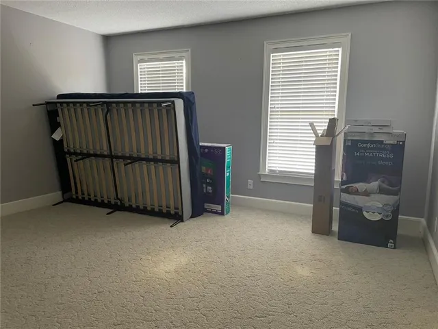 an empty room with windows