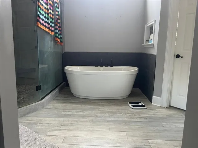 a bathroom with a toilet and a sink