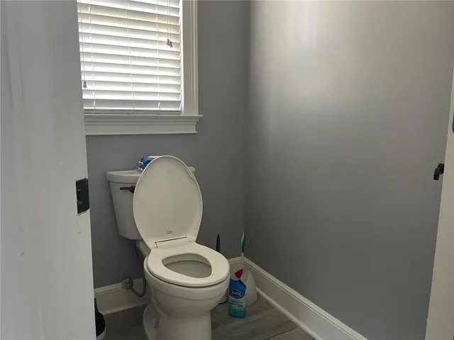 a bathroom with a sink and toilet