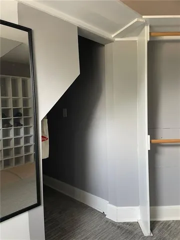 a view of swimming pool with trees in the background