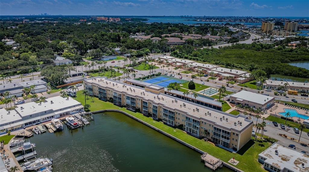 1 Boca Ciega Point Boulevard, Unit 314 St. Petersburg, FL 33708 - Photo 13 of 89 a view of a city with lawn chairs