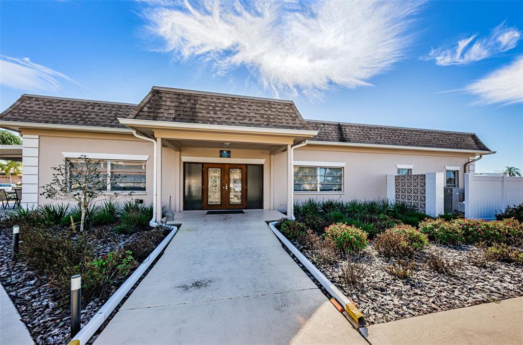 1 Boca Ciega Point Boulevard, Unit 314 St. Petersburg, FL 33708 - Photo 40 of 89 a view of a house with potted plants