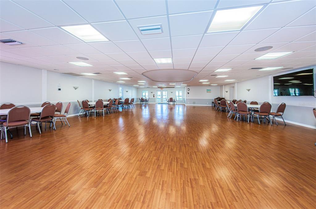 1 Boca Ciega Point Boulevard, Unit 314 St. Petersburg, FL 33708 - Photo 82 of 89 a room with lots of furniture and wooden floors