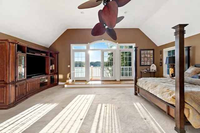 a bedroom with a bed and glass floor