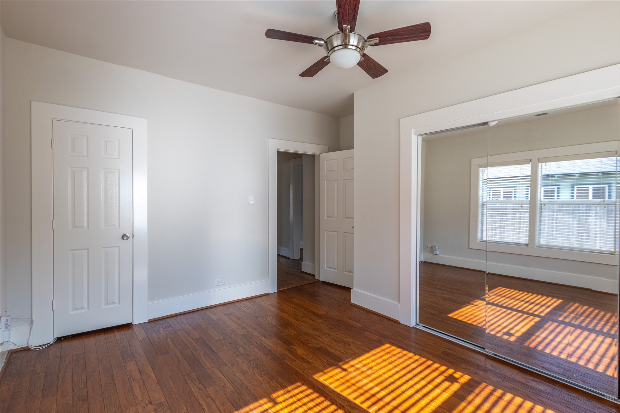 2009 Singleton Street Houston, TX 77008 - Photo 16 of 24 a view of empty room with wooden floor and fan