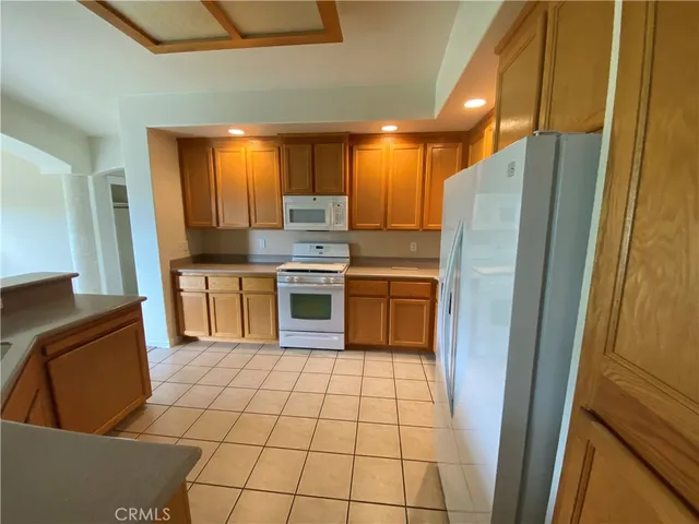 a view of a kitchen with a sink