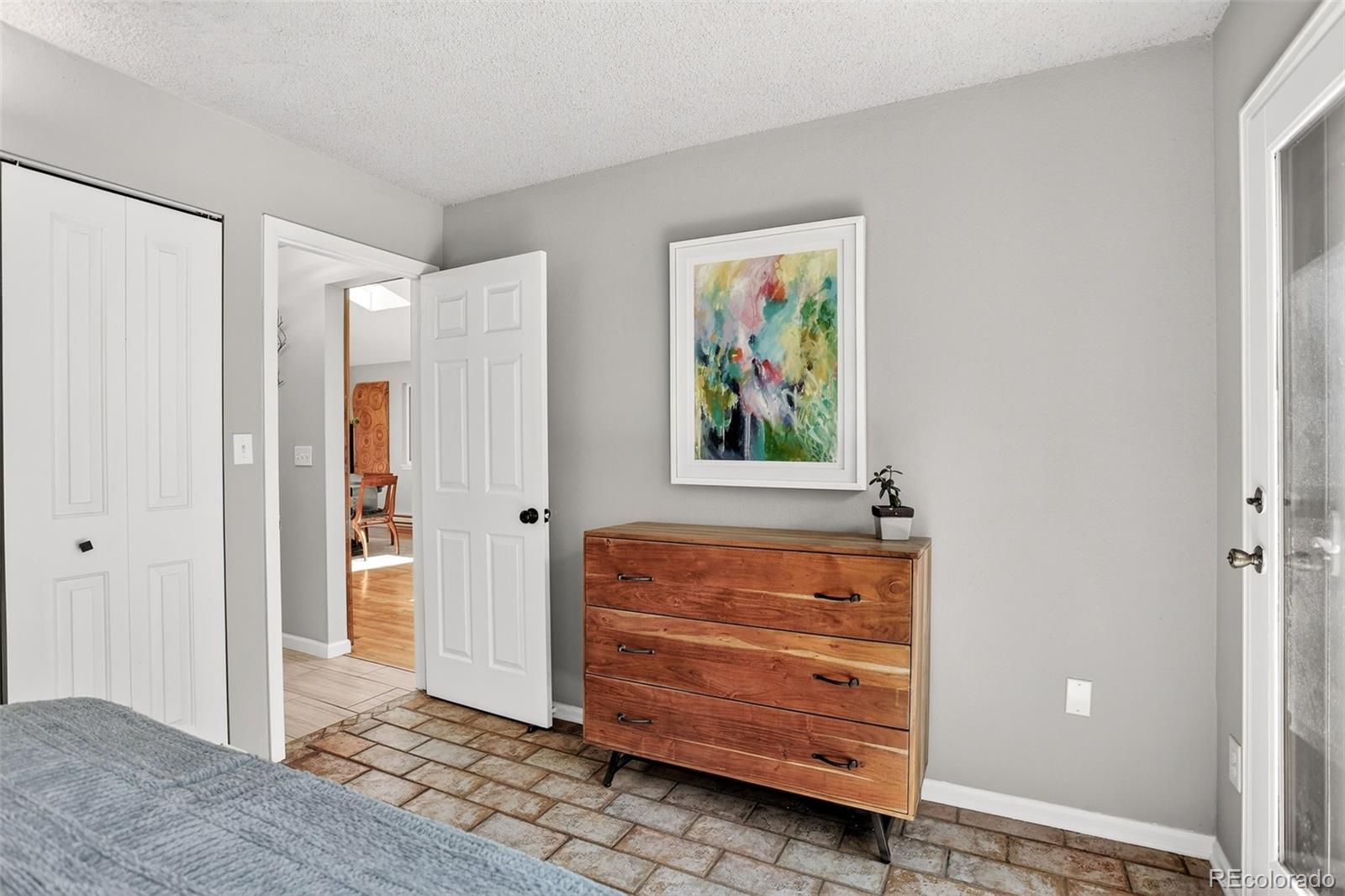 8515 Doubleheader Ranch Road Morrison, CO 80465 - Photo 21 of 42 a view of an entryway with wooden floor