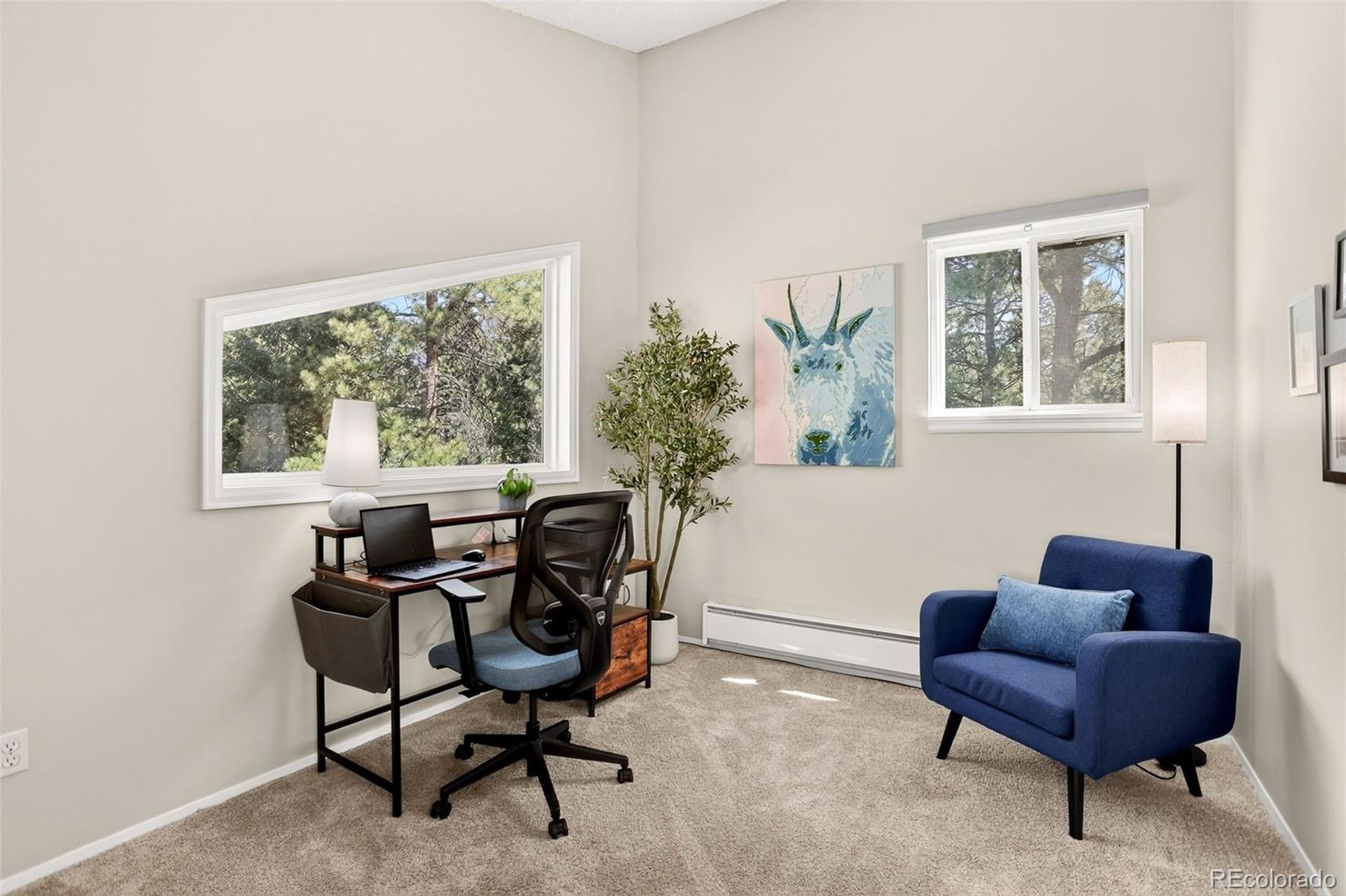 8515 Doubleheader Ranch Road Morrison, CO 80465 - Photo 22 of 42 a work room with furniture and a window