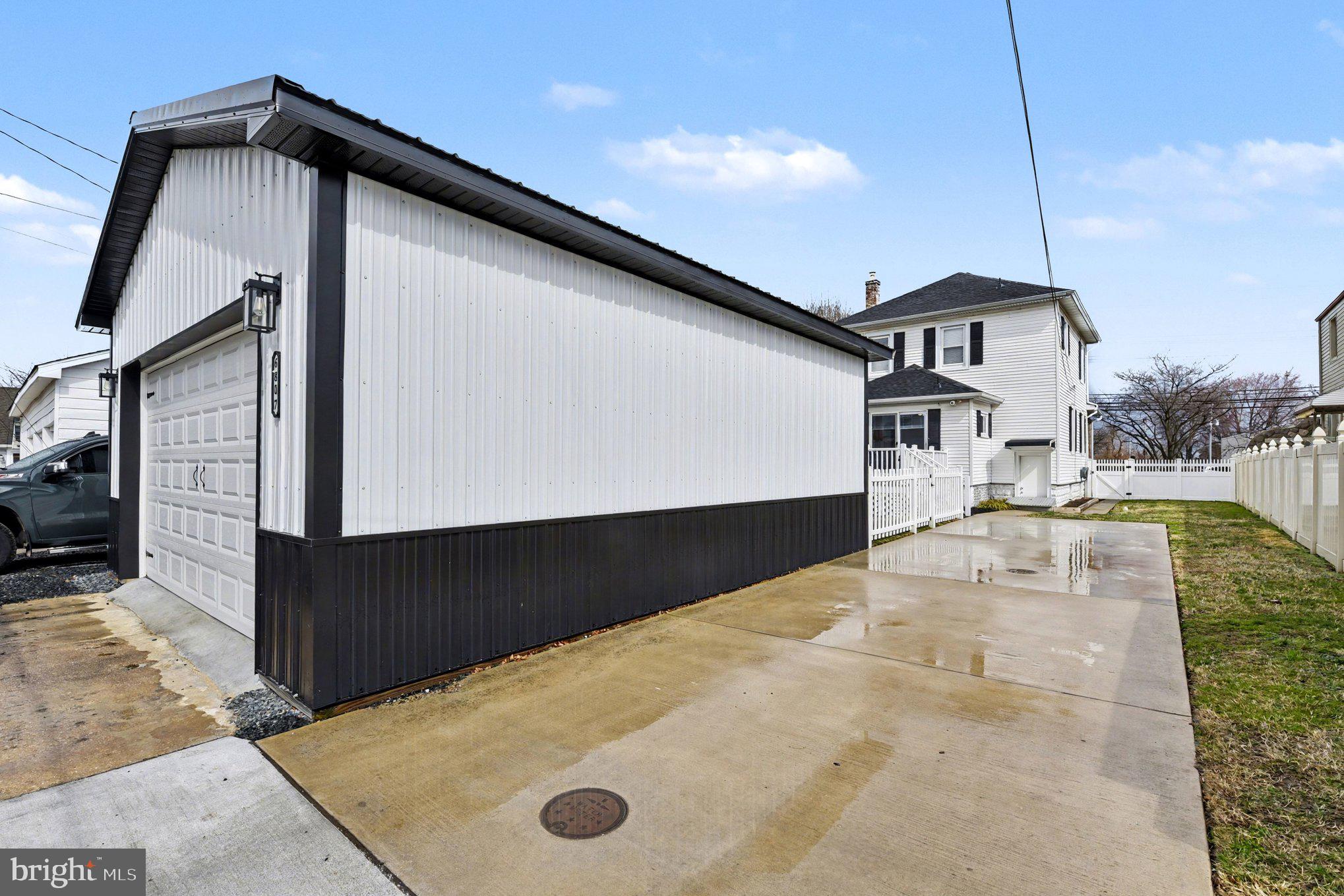 6807 North Point Road Sparrows Point, MD 21219 - Photo 26 of 28 a view of a house with a backyard