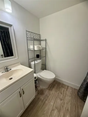 a bathroom with a sink and a toilet