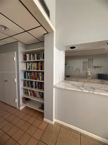 a room with a book shelf