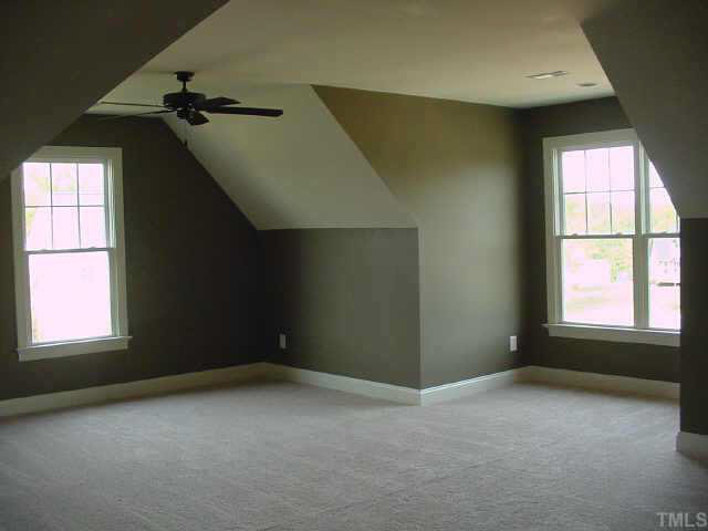 406 Waterville Street Raleigh, NC 27603 - Photo 9 of 10 The finished bonus is spacious and provides walk out access to unfinished storage. Other