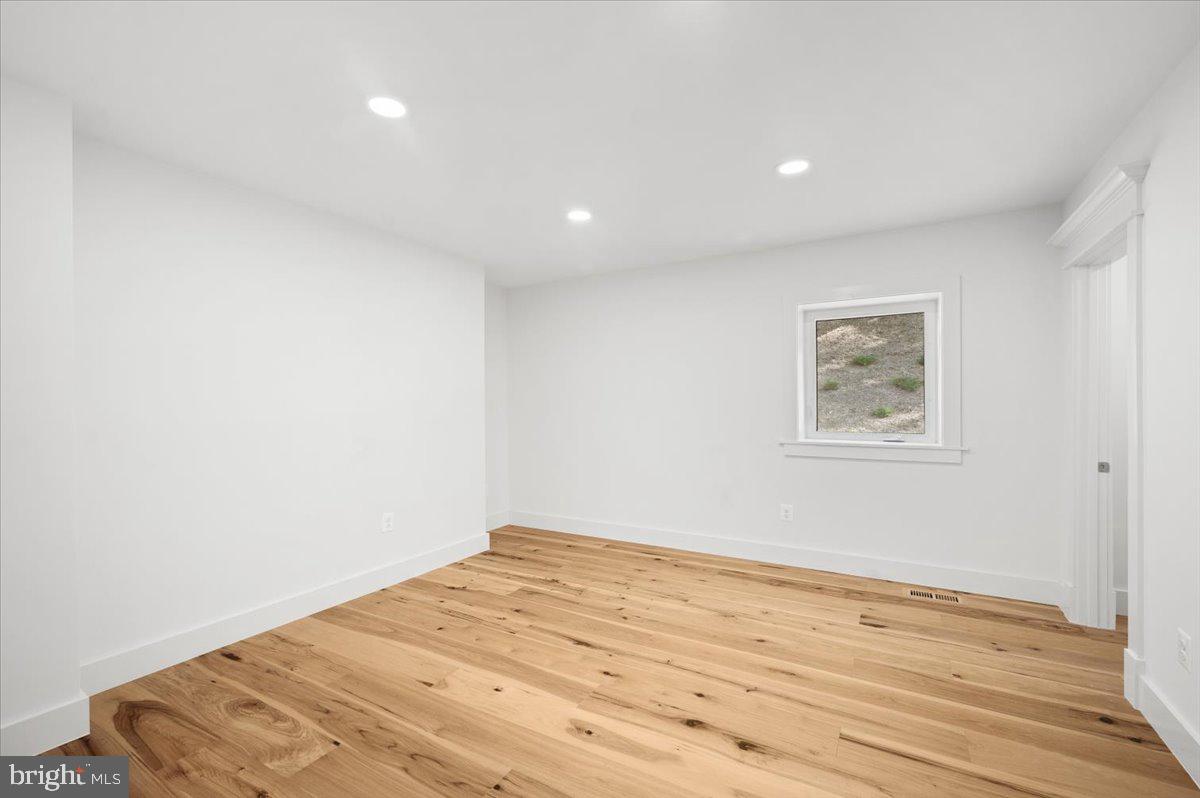 4117 Crow Rock Road Myersville, MD 21773 - Photo 22 of 97 a view of a room with wooden floor