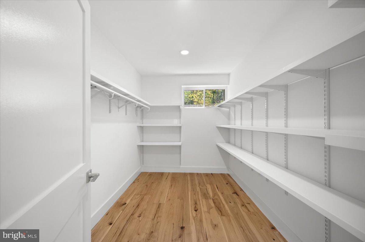 4117 Crow Rock Road Myersville, MD 21773 - Photo 38 of 97 a view of walk in closet with empty racks