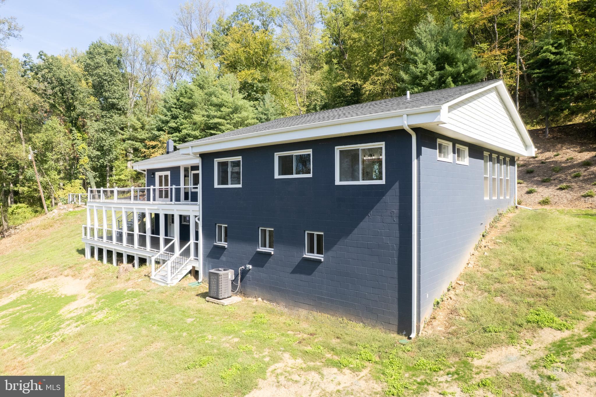 4117 Crow Rock Road Myersville, MD 21773 - Photo 67 of 97 a view of a house with pool and sitting area