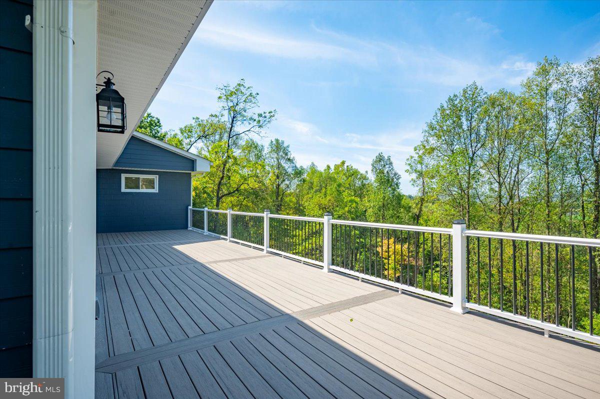 4117 Crow Rock Road Myersville, MD 21773 - Photo 74 of 97 a view of a balcony with wooden floor