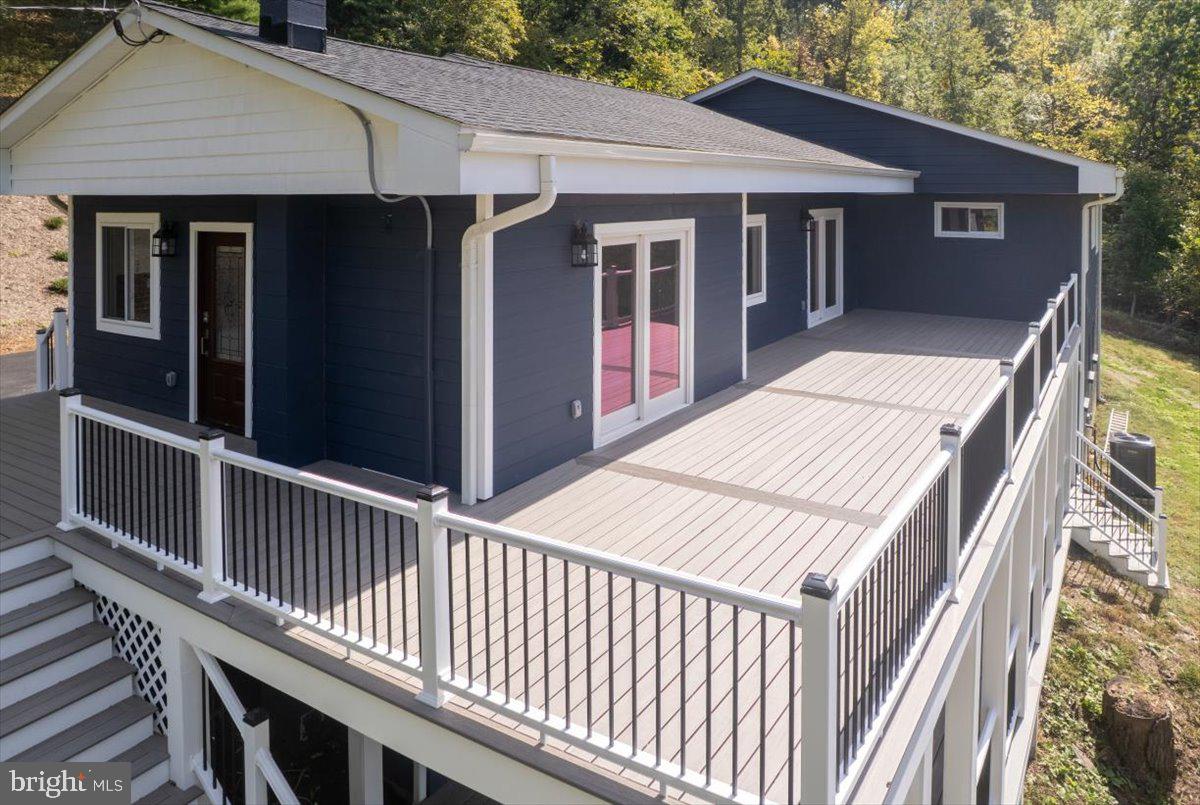 4117 Crow Rock Road Myersville, MD 21773 - Photo 75 of 97 a view of a house with a deck