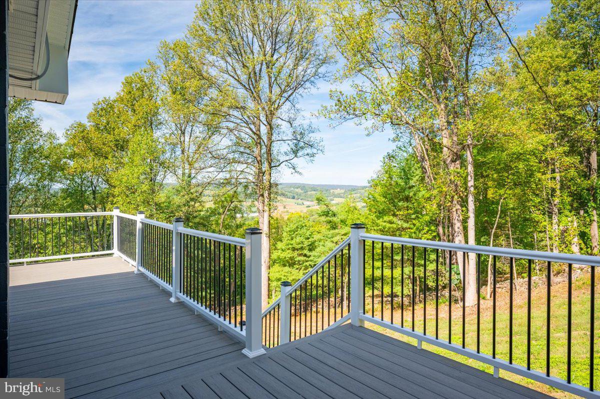 4117 Crow Rock Road Myersville, MD 21773 - Photo 81 of 97 a view of a balcony with wooden floor