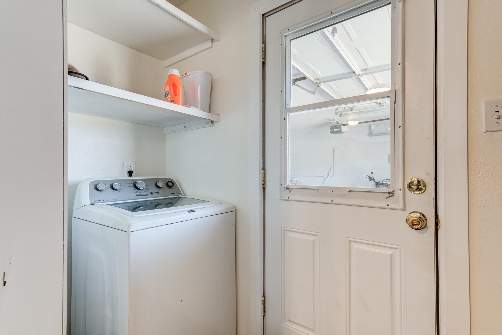 2141 71st Street Lubbock, TX 79412 - Photo 23 of 36 a utility room with dryer and washer
