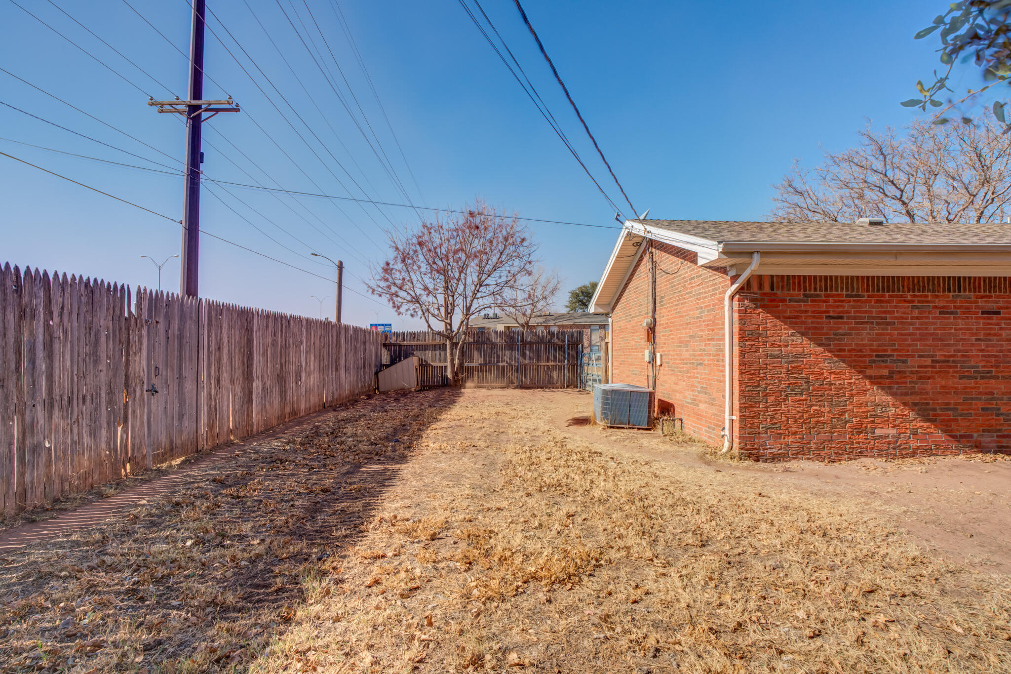 2141 71st Street Lubbock, TX 79412 - Photo 35 of 36 a view of a backyard