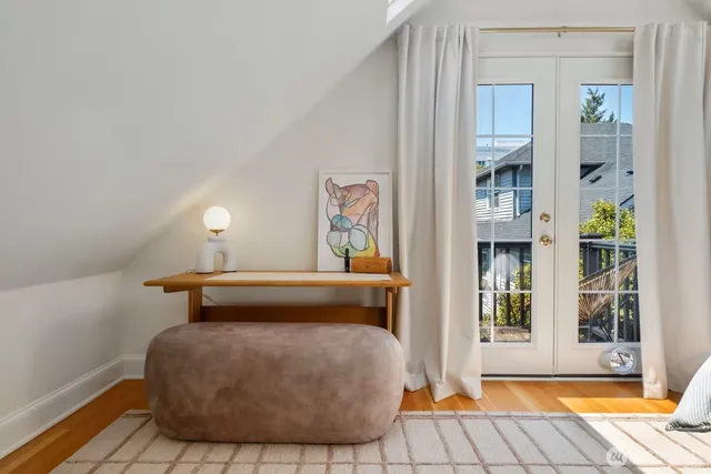 a living room with furniture and a rug