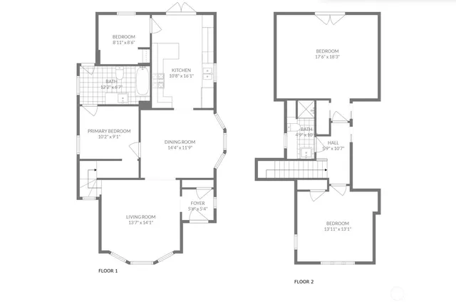 an aerial view of residential house with outdoor space and parking