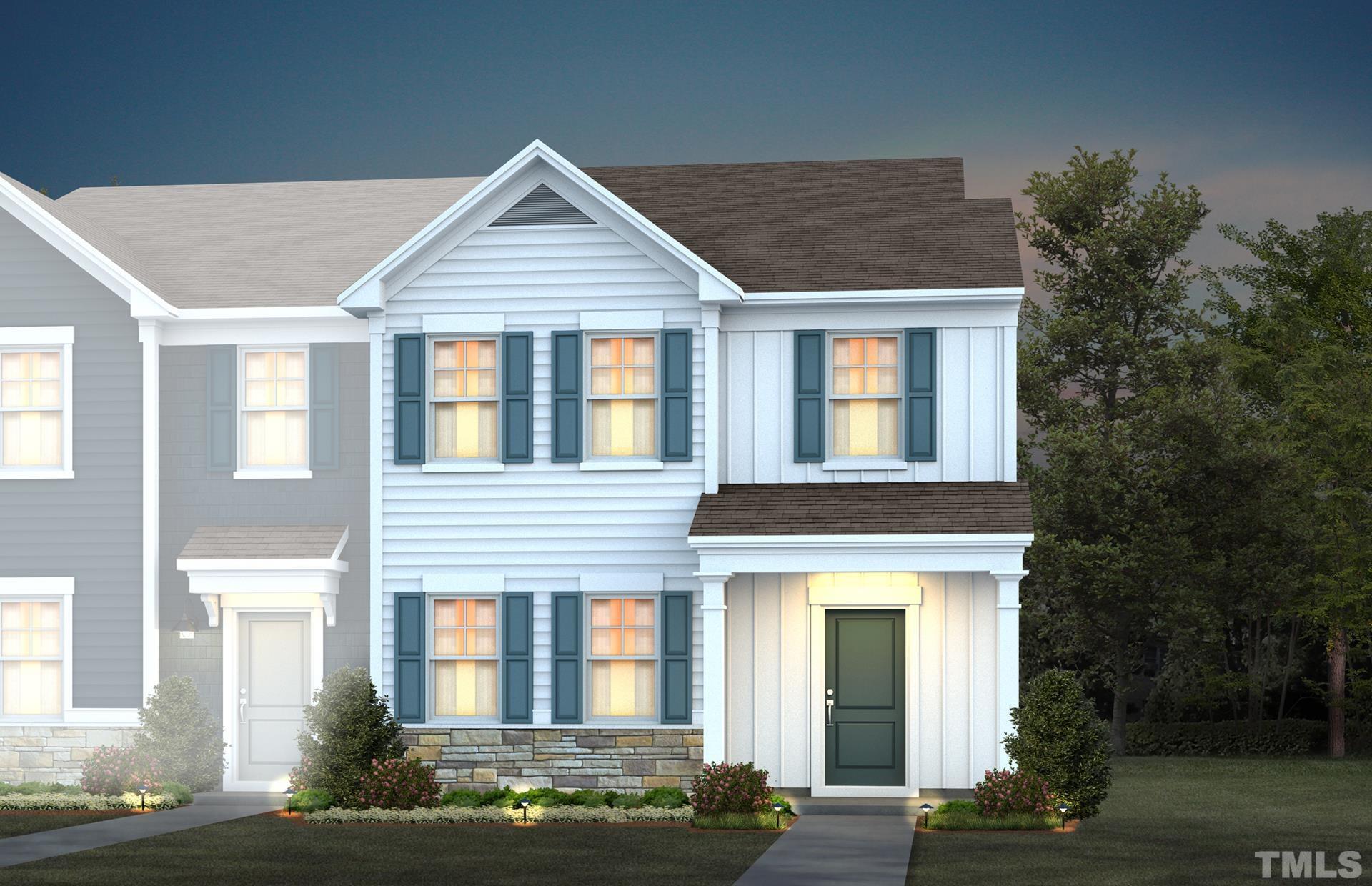 4906 Megara Run, Unit ROYAL Raleigh, NC 27603 - Photo 1 of 23 a front view of a house with garden