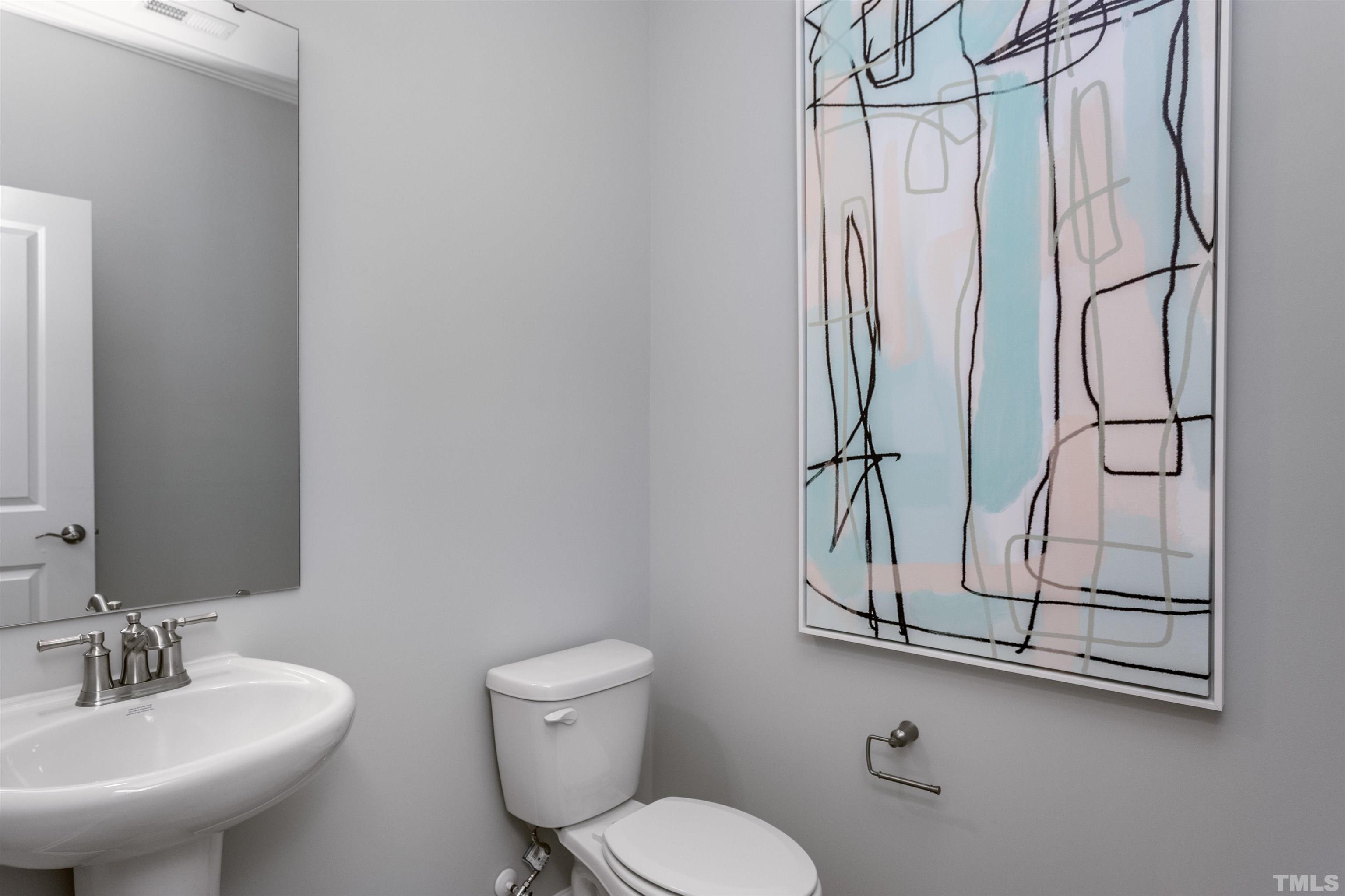 4906 Megara Run, Unit ROYAL Raleigh, NC 27603 - Photo 14 of 23 a bathroom with a toilet sink and shower