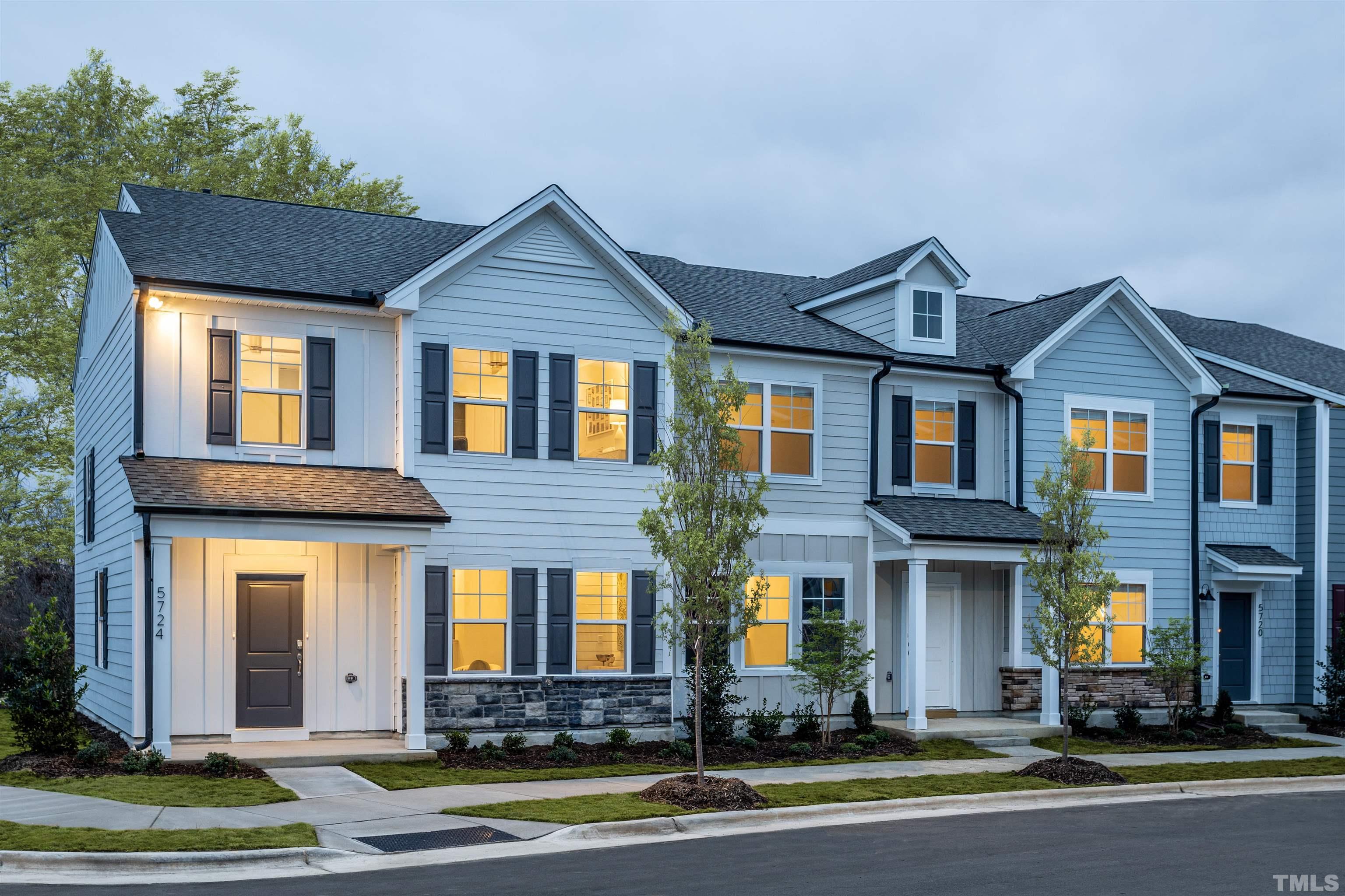 4906 Megara Run, Unit ROYAL Raleigh, NC 27603 - Photo 2 of 23 a front view of a house with a yard