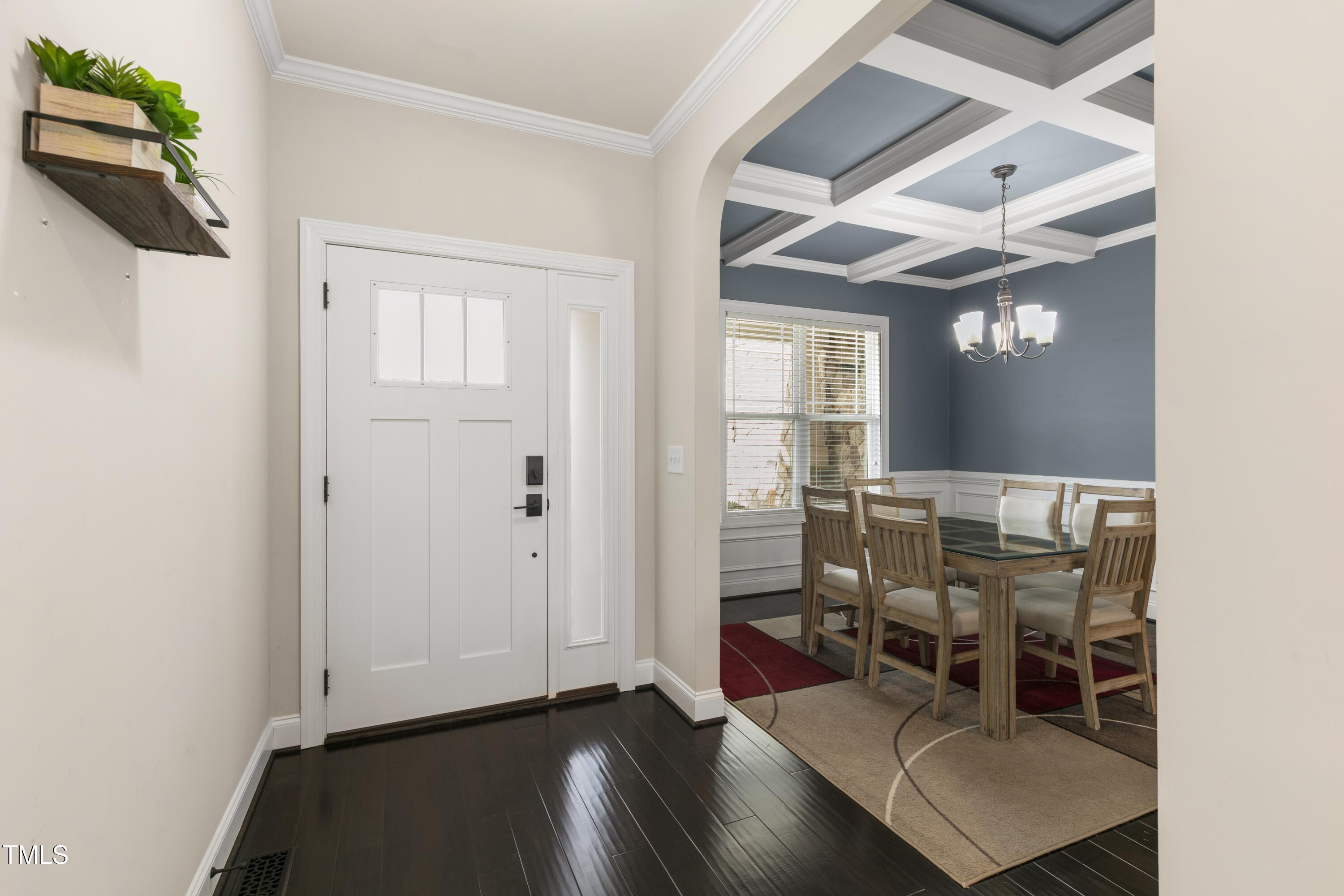 1044 Butterfly Circle Wake Forest, NC 27587 - Photo 3 of 46 an entryway and livingroom with furniture