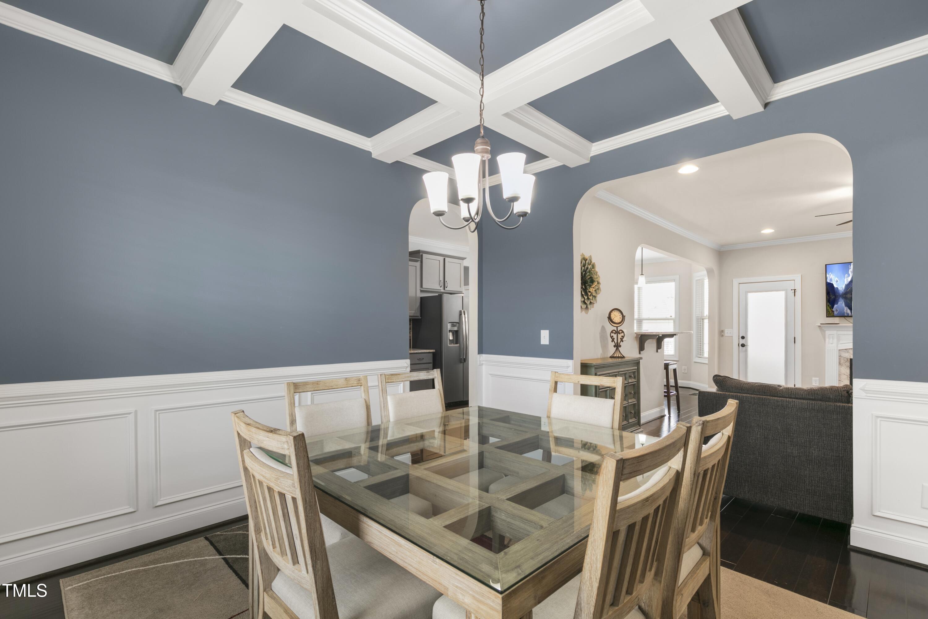 1044 Butterfly Circle Wake Forest, NC 27587 - Photo 5 of 46 a view of a dining room with furniture and wooden floor