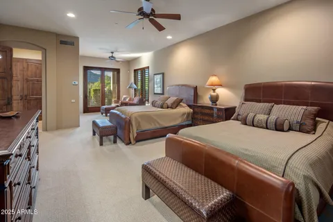 a bathroom with a bathtub and a window