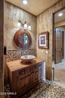 a view of a patio with couches table and chairs and potted plants