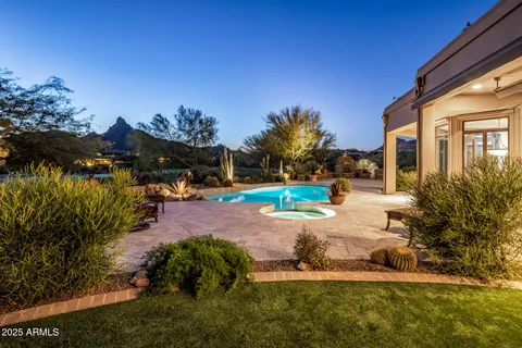 a view of a lake in middle of forest