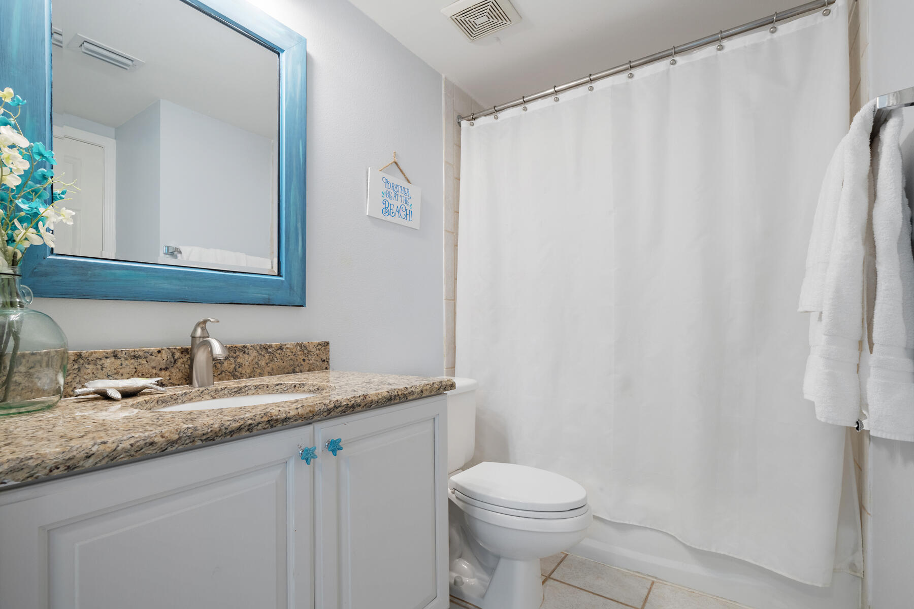 520 Santa Rosa Boulevard, Unit 705 Fort Walton Beach, FL 32548 - Photo 20 of 28 a bathroom with a granite countertop sink and a mirror