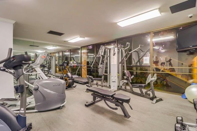 a view of an outdoor space and basketball court