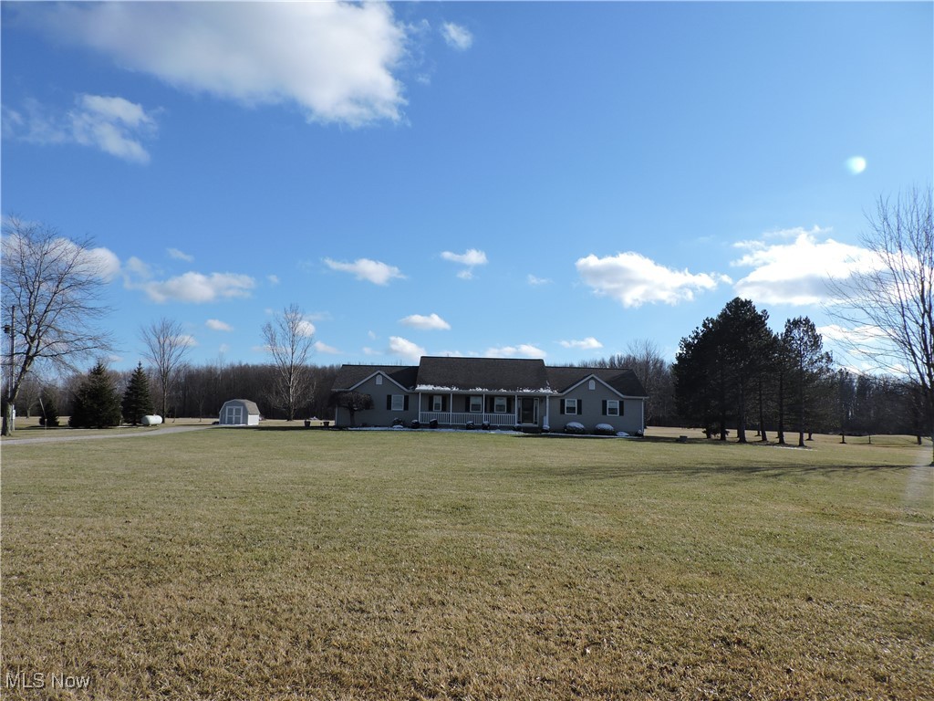 42059 Biggs Road Lagrange, OH 44050 - Photo 12 of 25 View of front facade with a front lawn