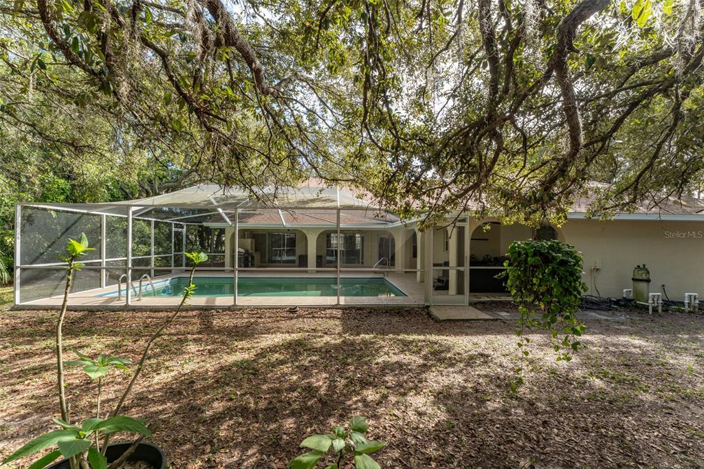 5142 South Louise Point Homosassa, FL 34446 - Photo 14 of 55 a view of house with a backyard