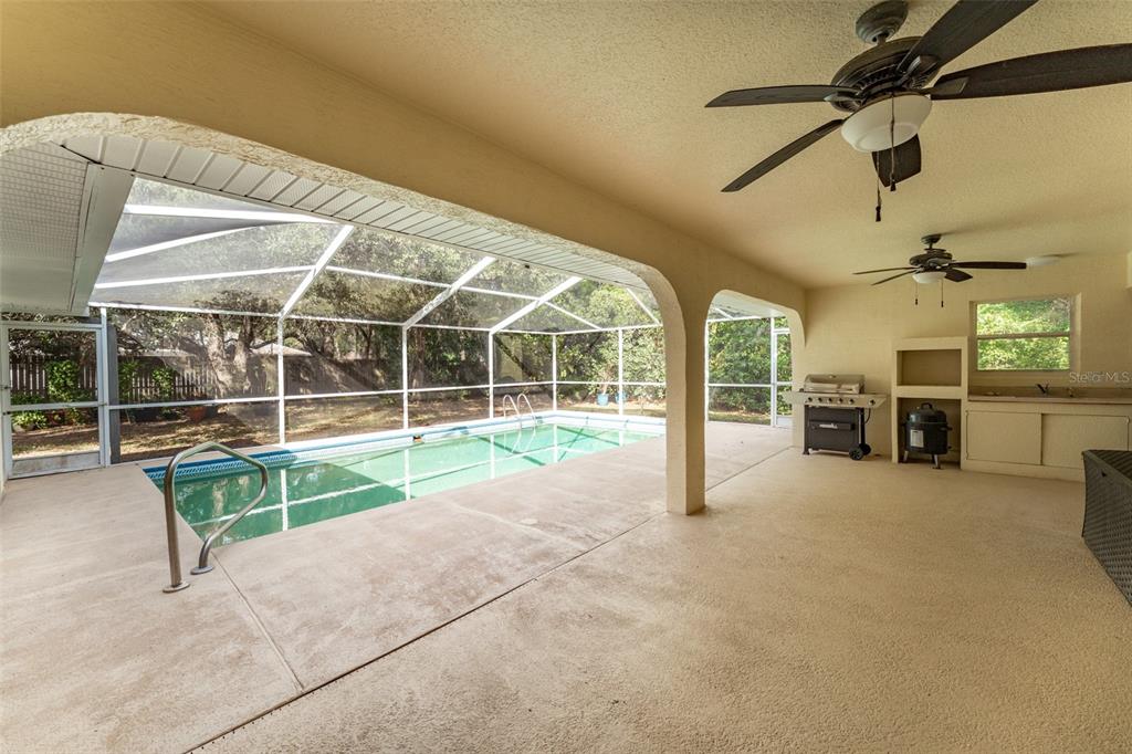 5142 South Louise Point Homosassa, FL 34446 - Photo 21 of 55 a view of a house with a backyard