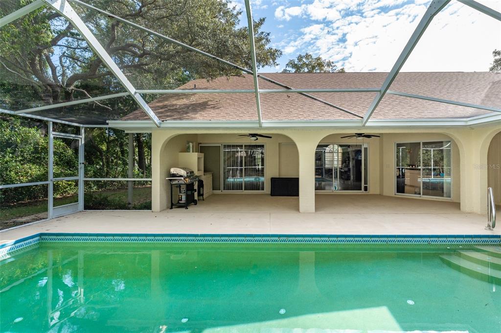5142 South Louise Point Homosassa, FL 34446 - Photo 25 of 55 a view of a house with a porch and a yard