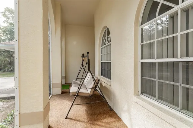a bath tub sitting next to a window